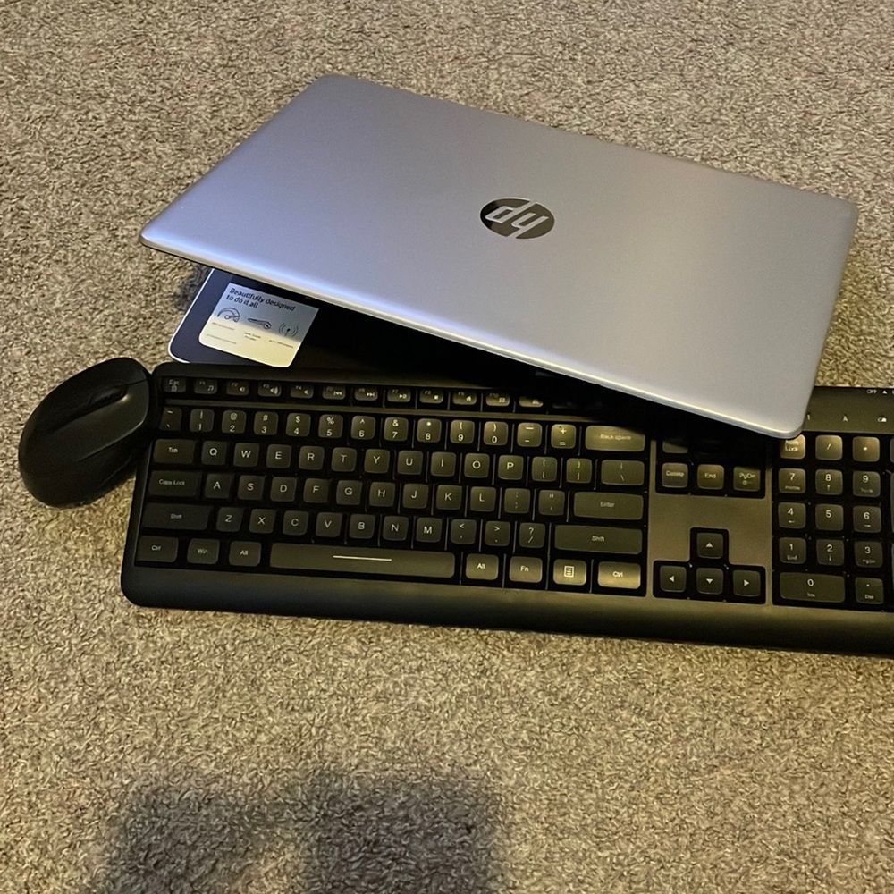 HP Laptop with Bluetooth keyboard and mouse